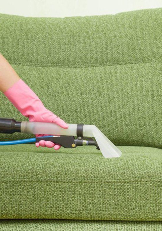 Green Couch Getting Cleaned — Carpet Cleaning in Bowen, QLD