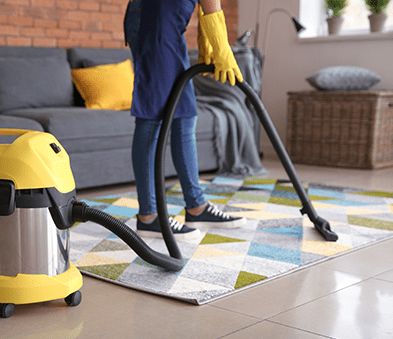 Worker Cleaning Carpet — Carpet Cleaning in Bowen, QLD
